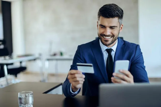Happy Entrepreneur Online Banking With Credit Card Mobile Phone Office X - Certified Payment Professional study guide