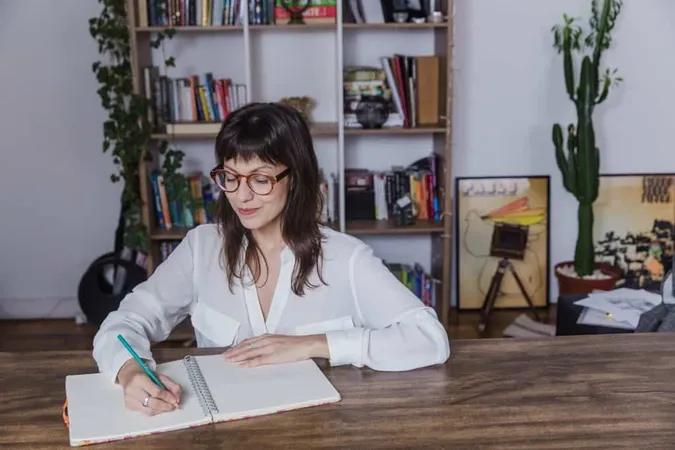 Modern Woman With Glasses Writing X - Certified Professional Proofreader study guide