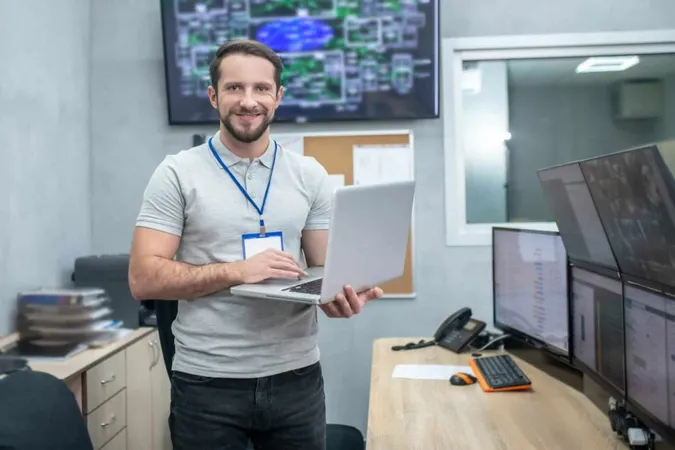 Work Observation Smiling Young Bearded Man With Laptop Hands Specially Equipped High Tech Room X - Certified Pega System Architect study guide