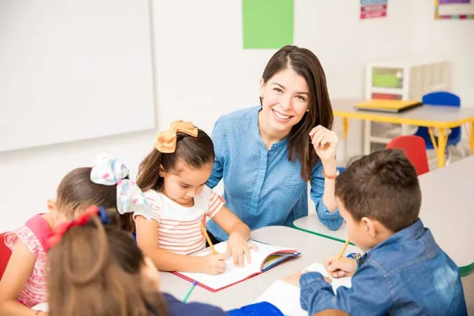 Portrait Gorgeous Hispanic Preschool Teacher Teaching Her Students Classroom X - Certified Preschool Teacher study guide