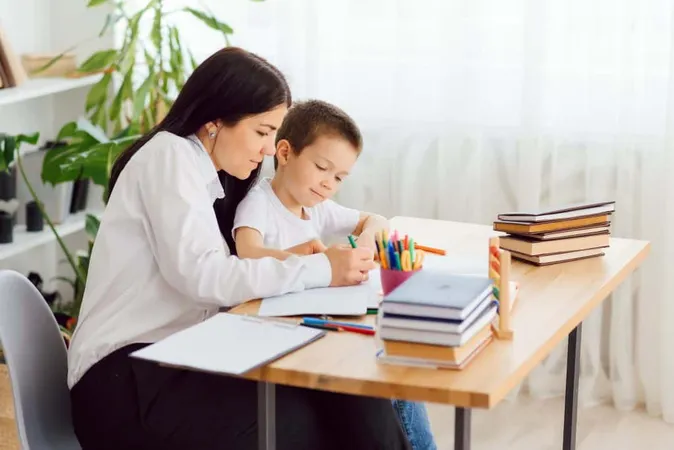 Portrait Handsome Boy Workplace With His Tutor Sitting Near By Telling Something X - Certified Private Tutor study guide