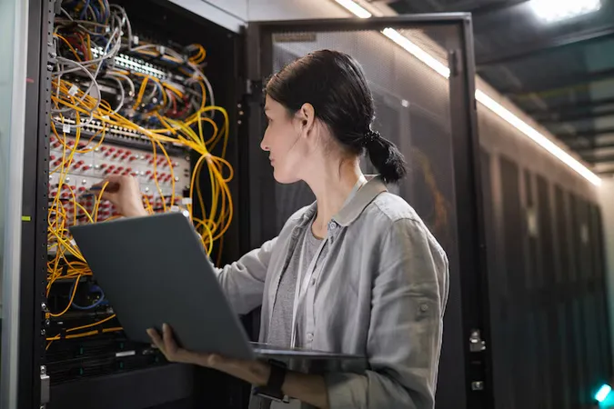 Waist Up Female Network Engineer Connecting Cables Server Cabinet While Working With Supercomputer Data Center Copy Space 1 - ASQ Certified Quality Improvement Associate study guide