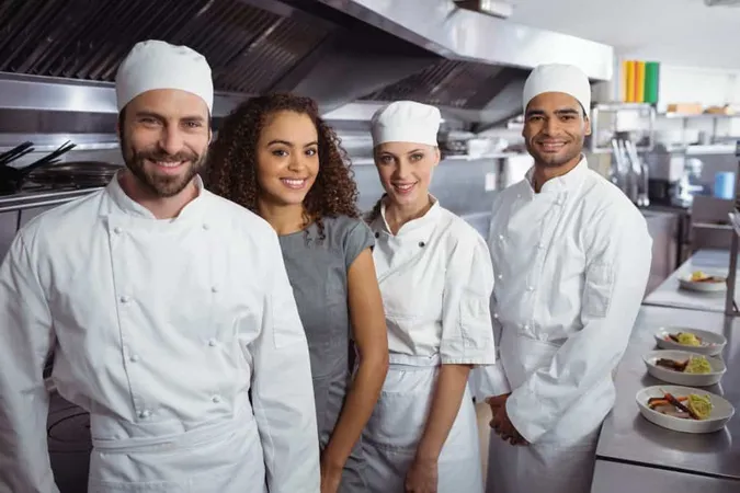 Restaurant Manager With His Kitchen Staff X - Certified Restaurant Manager study guide