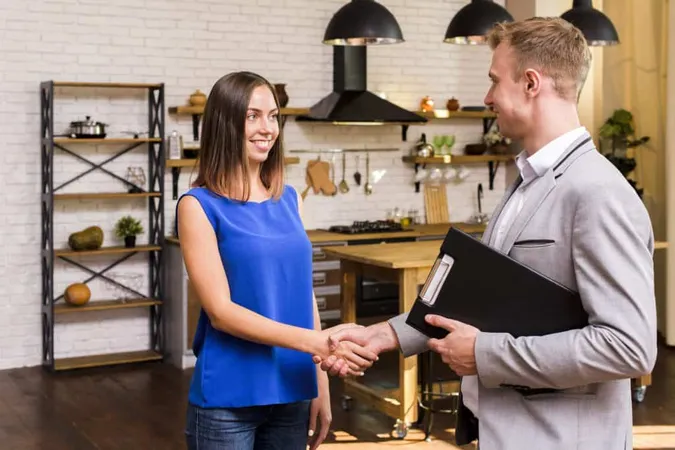 Young Woman Shaking Hand With Businessman X - Certified Sales Associate study guide