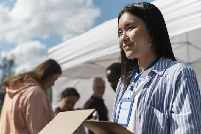 Group People Volunteering Foodbank Poor People 1 X - Certified Volunteer Administrator study guide
