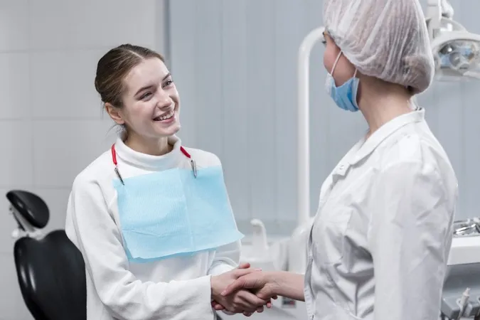 Patient Shaking Hand With Dentist X - Doctor of Medicine in Dentistry study guide