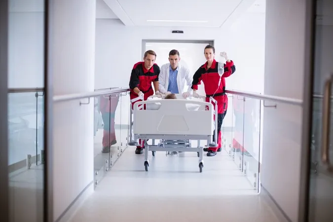 Doctors Pushing Emergency Stretcher Bed Corridor X - Emergency Medical Services Certified study guide