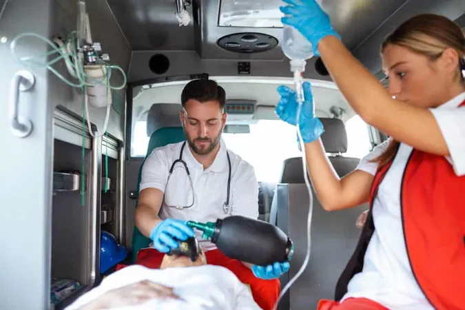 View From Inside Ambulance Uniformed Emergency Services Workers Caring Patient Stretcher Coronavirus Pandemic X - Emergency Medical Services Certified study guide