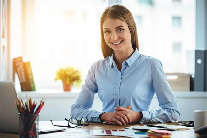 Toothy Smile From Real Expertise Cheerful Young Beautiful Woman Looking Camera With Smile While Sitting Her Working Place X - Finance and Accounting Certification study guide