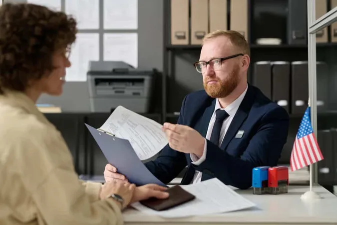 Portrait Bearded Male Consultant Working Us Embassy Office Holding Application Form While X - Federal Contracting Certification study guide