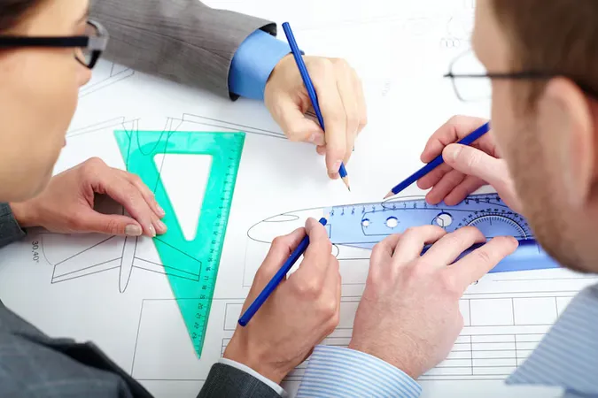 Close Up Engineers Improving Sketch - Geometric Dimensioning and Tolerancing Certification study guide