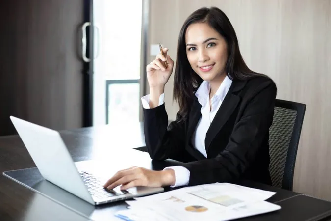 Asian Businesswomen Analysis Documents Graph Financial Diagram Working Office X - General study guide