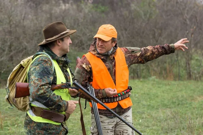 Silhouette Hunter With Gun Reeds Against Sun Ambush Ducks With Dogs X - Hunter Safety Certification study guide