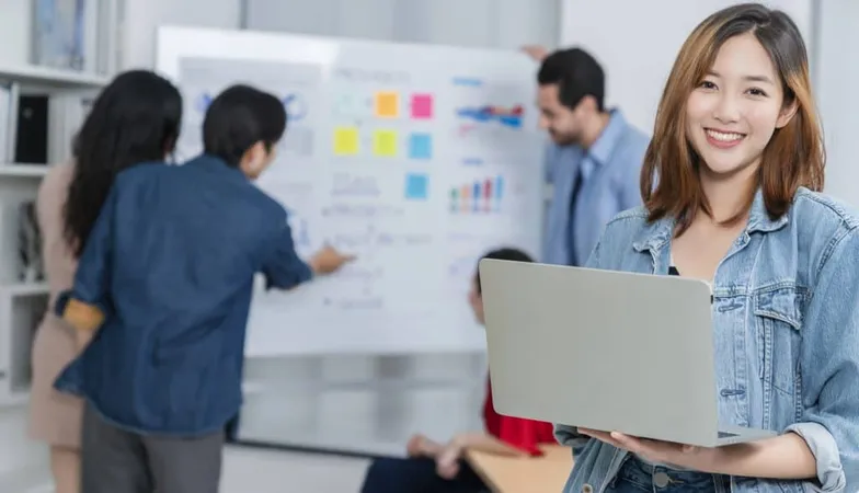 Smart Asian Startup Small Entrepreneur Standing Confident Portrait With Friends Partner Casual Meeting Brainstorm With White Board Business Financce Paper Chart Anslysis Office Background X - Infusionsoft Certified Partner study guide