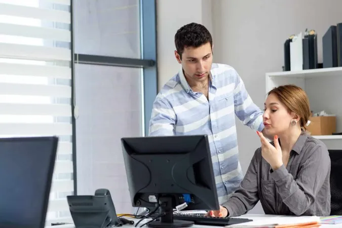Front View Young Beautiful Lady Grey Shirt Talking Discussing Something With Young Man Inside Office Daytime Building Job Activity X - ISO 9001 Certified Auditor study guide