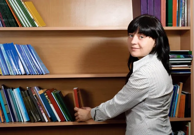 Portrait Woman Reading Book X - Library Support Staff Certification study guide