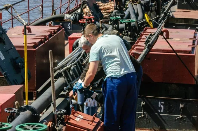 Russia Saint Petersburg May Two Male Sailors Work Deck Oil Tanker X - Marine Service Technician study guide