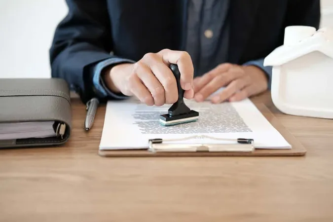 Midsection Man Using Smart Phone - Notary study guide