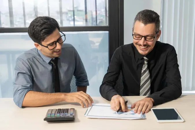 Jolly Business Partners Discussing Sales Development Meeting X - Registered Annuity Advisor study guide