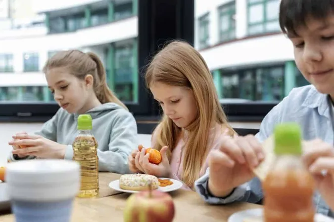 Students Having Lunch Canteen X - School Nutrition Association Certification study guide