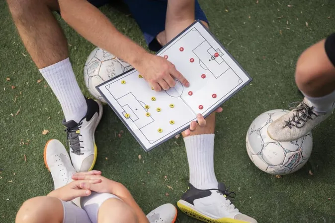 Football Trainer Teaching His Pupils 1 X - Soccer Coaching Certification study guide