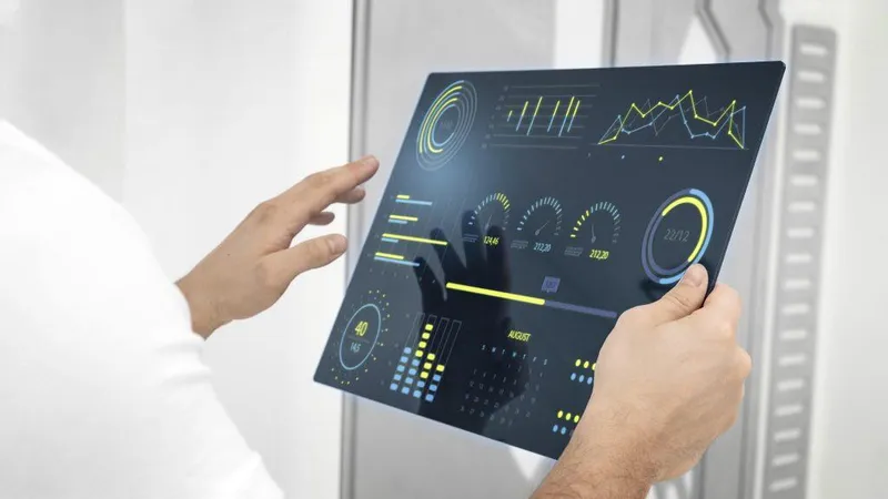 Close Up Hand Holding Futuristic Screen X - Statistical Process Control Certification study guide