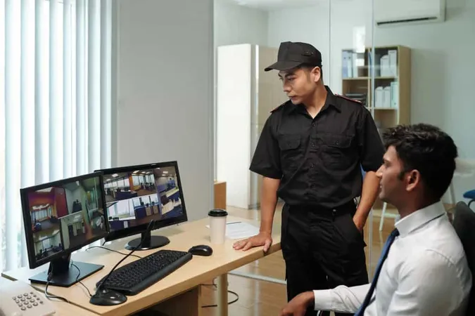 Guards Checking Surveillance Footage X - Safety and Security Practitioner Certification study guide