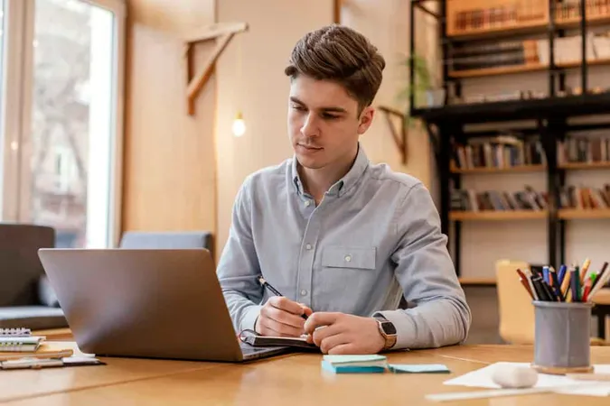 Portrait Man Working Laptop 1 1 - TOEFL study guide