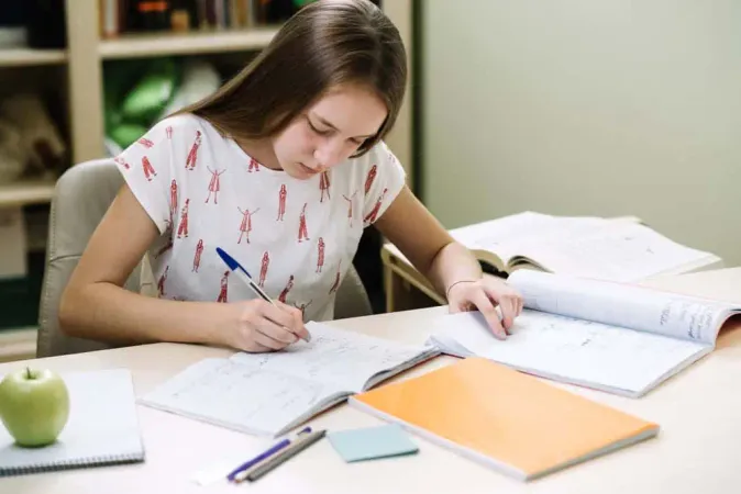 Thoughtful Girl Student Sitting 1 3 - TOEFL study guide