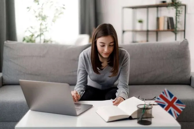 Woman Using Laptop Studying 1 1 - TOEFL study guide